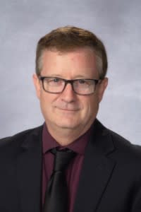 A headshot of Mr. Collier.